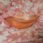 STATUETTE EN PIROGUE